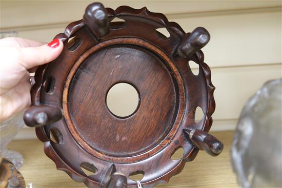 Two Chinese hardwood stands largest 20cm diameter